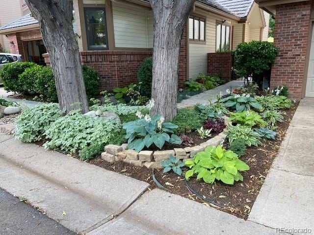 4565 E Mexico Ave Unit 3, Denver, CO 80222 - view of side of home with brick siding