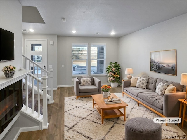 living room with wood-type flooring