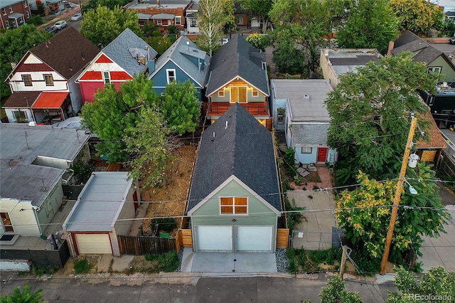 birds eye view of property with a residential view