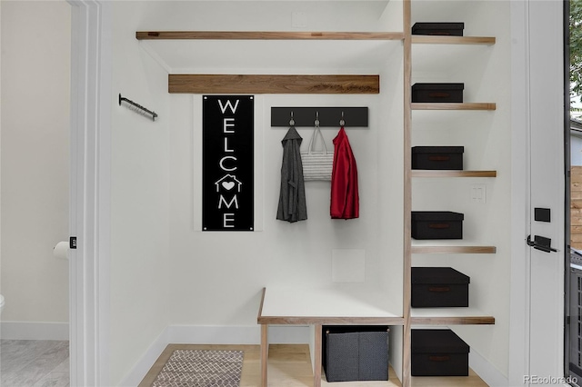 mudroom featuring baseboards