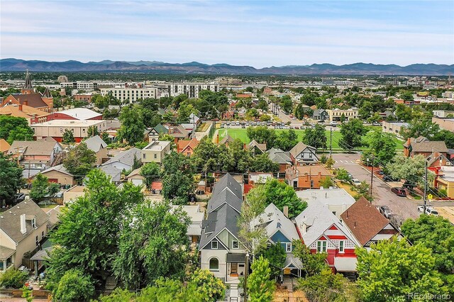 birds eye view of property with a residential view and a mountain view