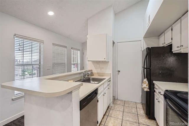 kitchen with stainless steel dishwasher, electric range, light countertops, white cabinetry, and a sink