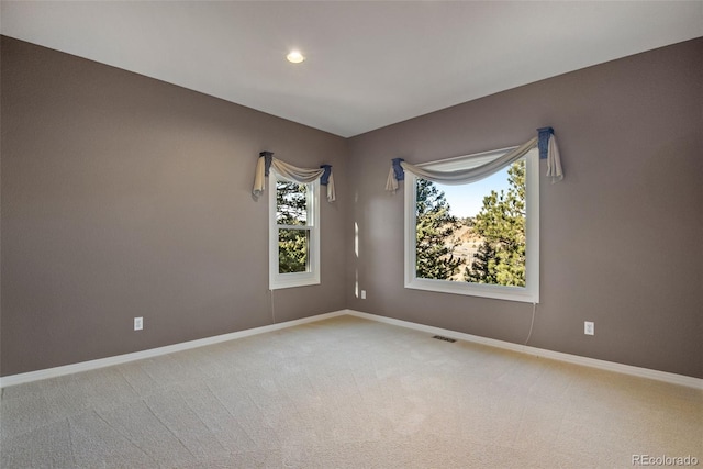 empty room with carpet flooring