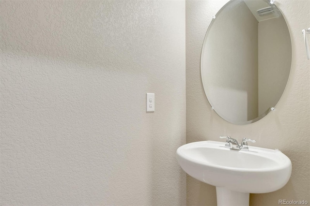 9910 Biscay St, Commerce City, CO 80022 - bathroom featuring a sink