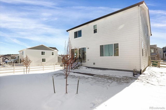 view of snow covered property