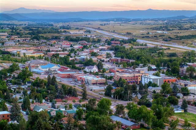 aerial view at dusk with a mountain view