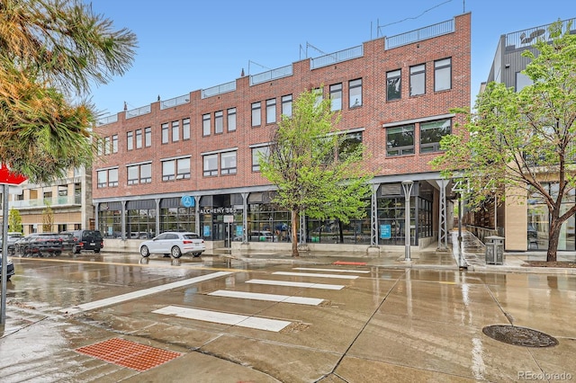 4144 Tennyson St Unit 10, Denver, CO 80212 - view of building exterior featuring uncovered parking