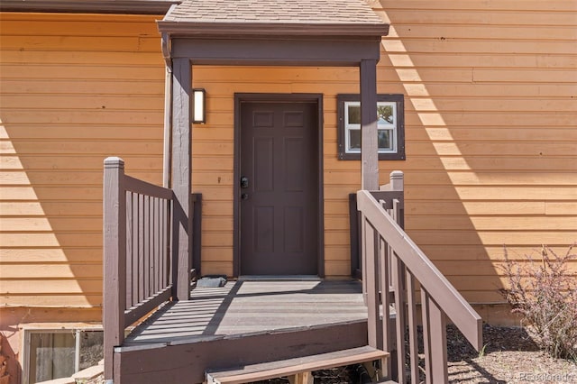 1345 Leslie Cir, Woodland Park, CO 80863 - property entrance featuring roof with shingles