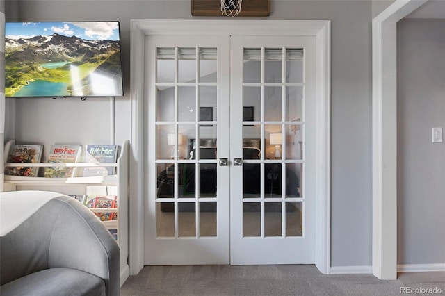 entryway featuring carpet flooring and french doors