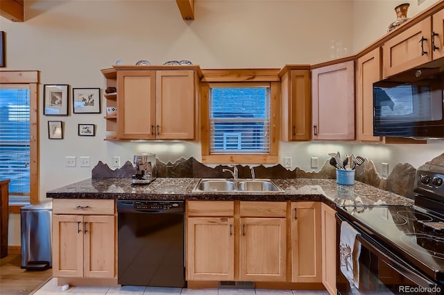 kitchen featuring light brown cabinetry, visible vents, a sink, open shelves, and black appliances