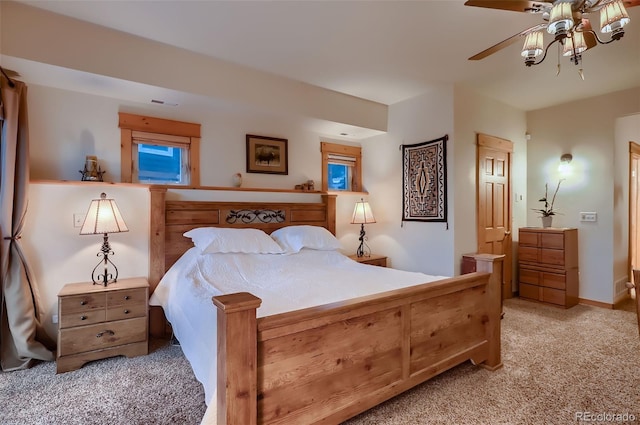 bedroom featuring ceiling fan, carpet, and visible vents