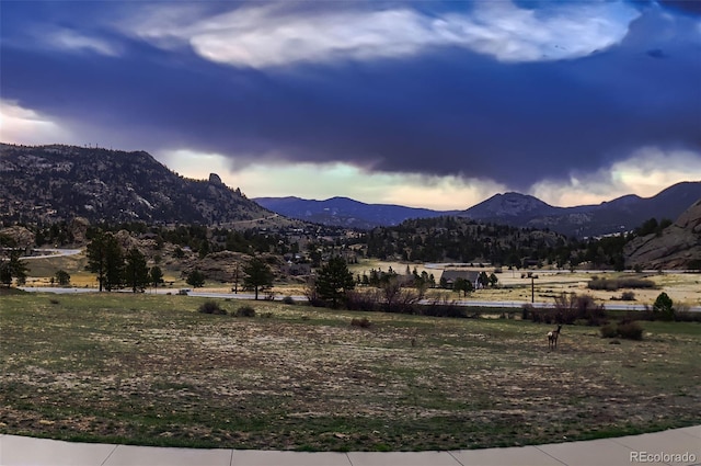 view of mountain feature with a rural view