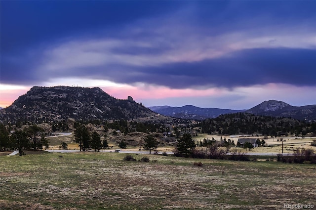 view of mountain feature featuring a rural view
