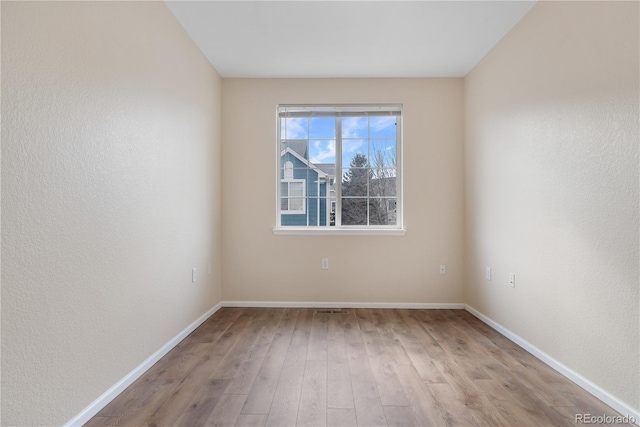 empty room featuring light wood-type flooring