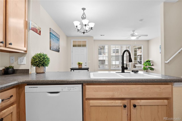 kitchen with sink, hanging light fixtures, white dishwasher, kitchen peninsula, and ceiling fan