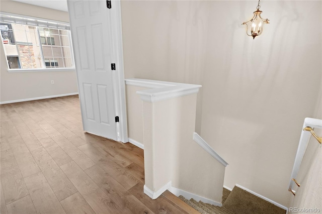 stairway featuring hardwood / wood-style flooring