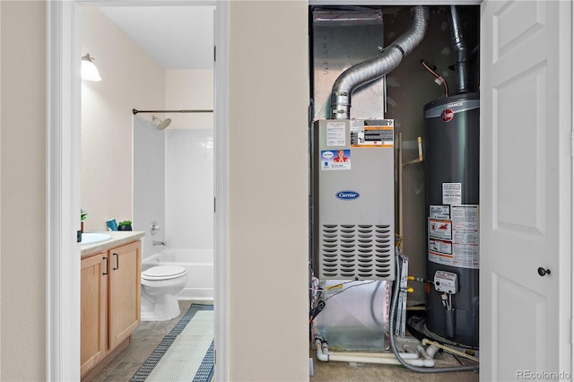 15945 E Geddes Dr Unit 54, Aurora, CO 80016 - utility room with water heater and a sink