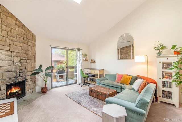 living room with light colored carpet, a fireplace, and lofted ceiling