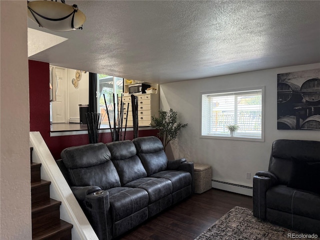 7132 Xavier Way, Westminster, CO 80030 - living area featuring baseboard heating, a textured ceiling, and wood finished floors