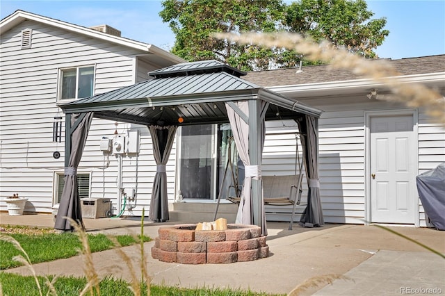 7132 Xavier Way, Westminster, CO 80030 - back of house with a gazebo, an outdoor fire pit, and a patio area