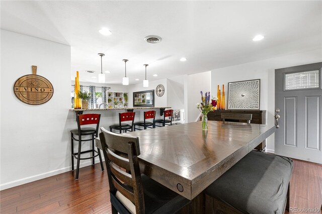 7132 Xavier Way, Westminster, CO 80030 - dining space with recessed lighting and dark wood-type flooring