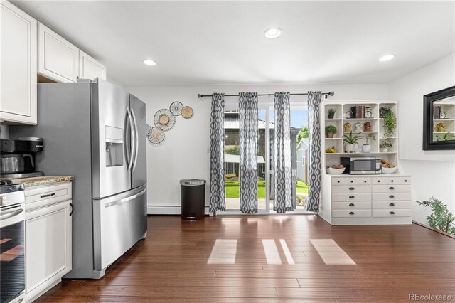 7132 Xavier Way, Westminster, CO 80030 - kitchen with a baseboard radiator, white cabinetry, dark wood-style floors, stainless steel appliances, and recessed lighting