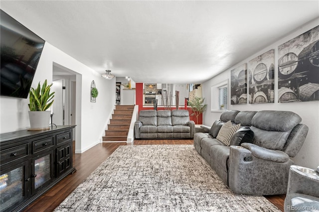 7132 Xavier Way, Westminster, CO 80030 - living room featuring dark wood-style floors and stairway