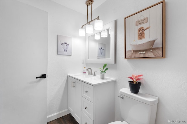 7132 Xavier Way, Westminster, CO 80030 - bathroom featuring vanity and wood finished floors