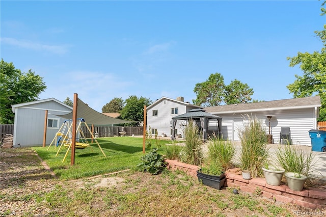 7132 Xavier Way, Westminster, CO 80030 - fenced backyard featuring a playground and a gazebo