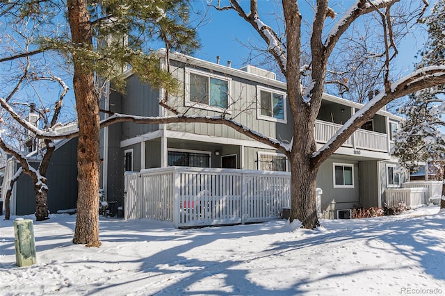 view of property featuring covered porch