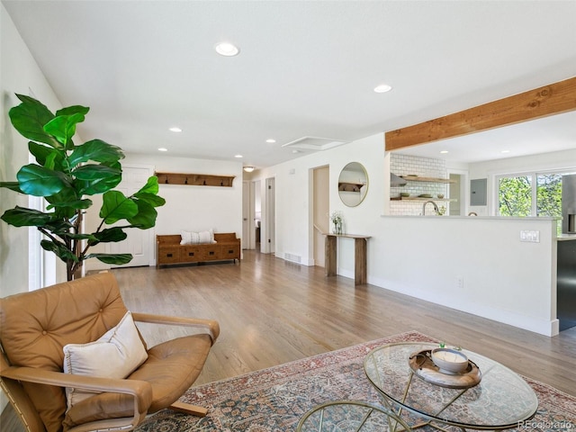 207 Iowa Dr, Golden, CO 80403 - living room with recessed lighting, wood finished floors, and beam ceiling