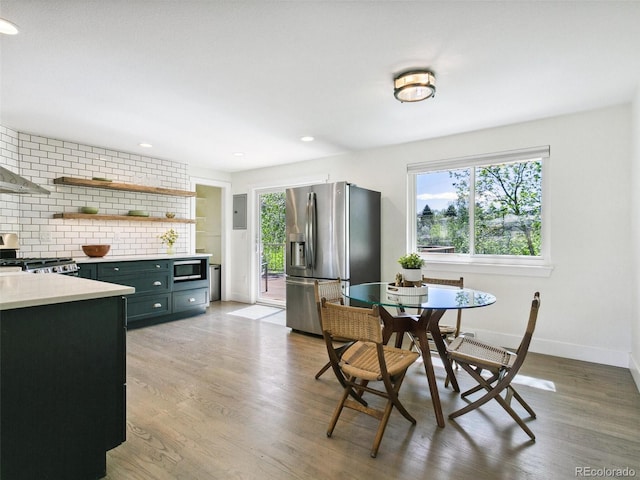207 Iowa Dr, Golden, CO 80403 - dining area with plenty of natural light, light wood-style flooring, baseboards, electric panel, and recessed lighting