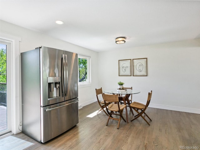 207 Iowa Dr, Golden, CO 80403 - dining area with plenty of natural light, wood finished floors, baseboards, and recessed lighting