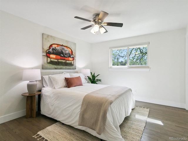 207 Iowa Dr, Golden, CO 80403 - bedroom with baseboards, wood finished floors, and ceiling fan