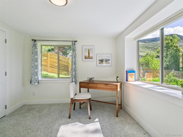 207 Iowa Dr, Golden, CO 80403 - home office featuring healthy amount of natural light, carpet flooring, and baseboards