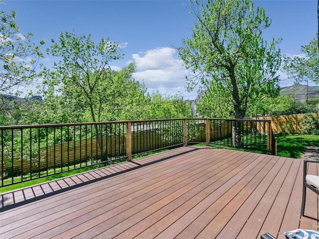 207 Iowa Dr, Golden, CO 80403 - wooden terrace featuring a fenced backyard