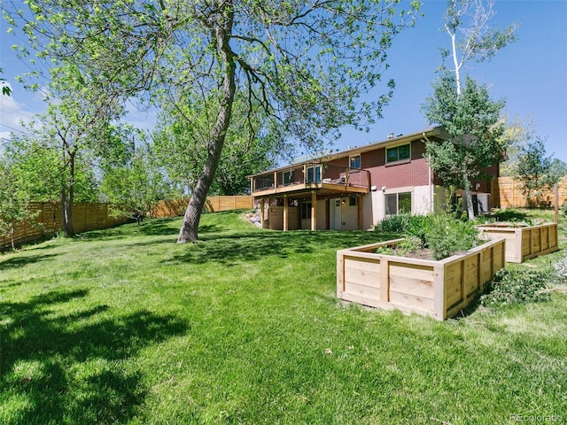 207 Iowa Dr, Golden, CO 80403 - view of yard with a deck and a garden