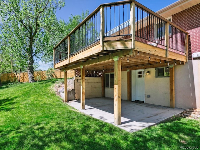 207 Iowa Dr, Golden, CO 80403 - back of property featuring a patio and a wooden deck