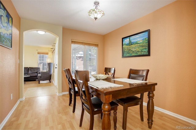 dining space featuring light hardwood / wood-style floors