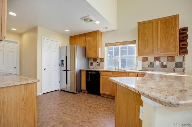 kitchen featuring dishwasher, backsplash, sink, kitchen peninsula, and stainless steel fridge with ice dispenser