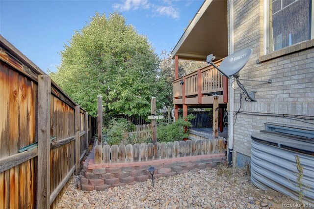 exterior space featuring a wooden deck