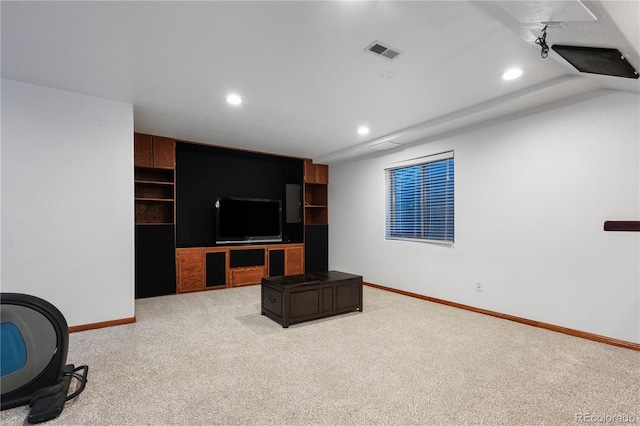 living area with baseboards, recessed lighting, visible vents, and light colored carpet