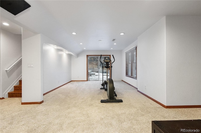 exercise area with light carpet, recessed lighting, visible vents, and baseboards