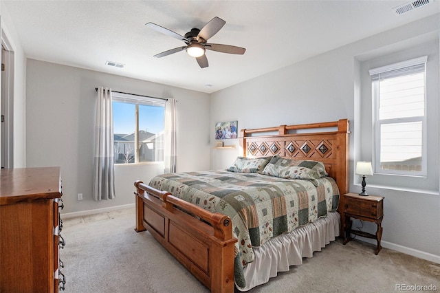 carpeted bedroom featuring ceiling fan