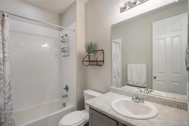 full bathroom with shower / bath combo, toilet, and vanity