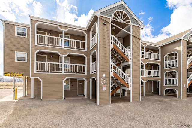 view of building exterior featuring stairs