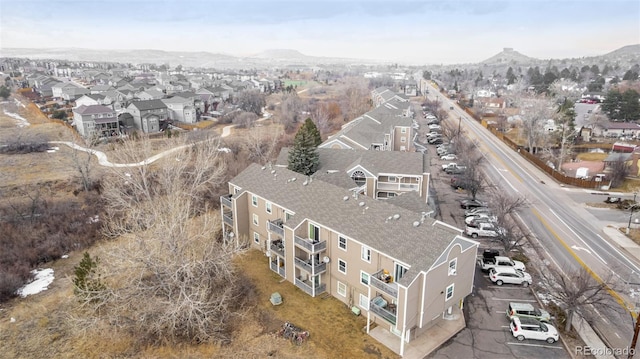 bird's eye view with a residential view and a mountain view