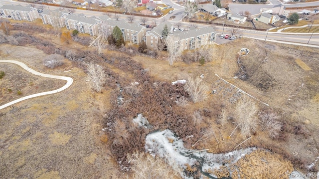 birds eye view of property with a residential view