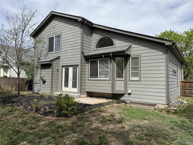 4338 N Ceylon Ct, Denver, CO 80249 - rear view of house with french doors