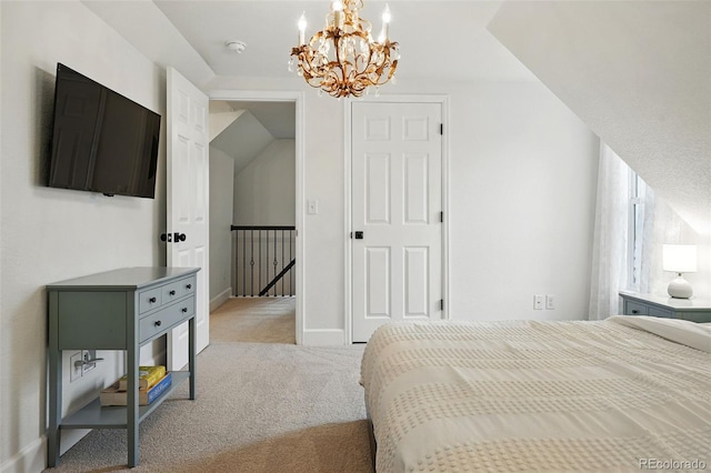 6830 Lamar St, Arvada, CO 80003 - carpeted bedroom with a chandelier and baseboards